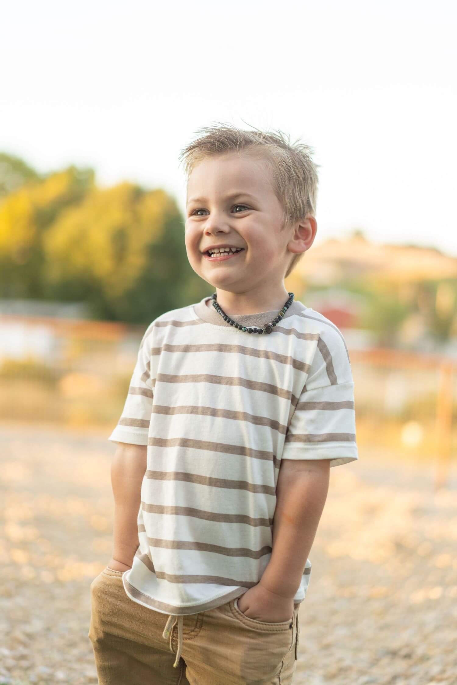 7-smiling-boy-outdoors-sunny-day.jpg