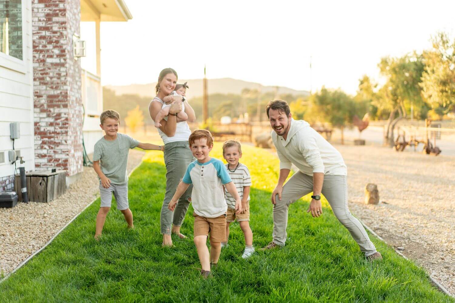 2-happy-family-outdoors-with-kids-dog.jpg