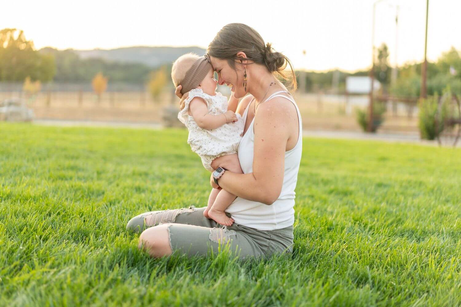 8-mother-playing-with-baby-outdoors.jpg