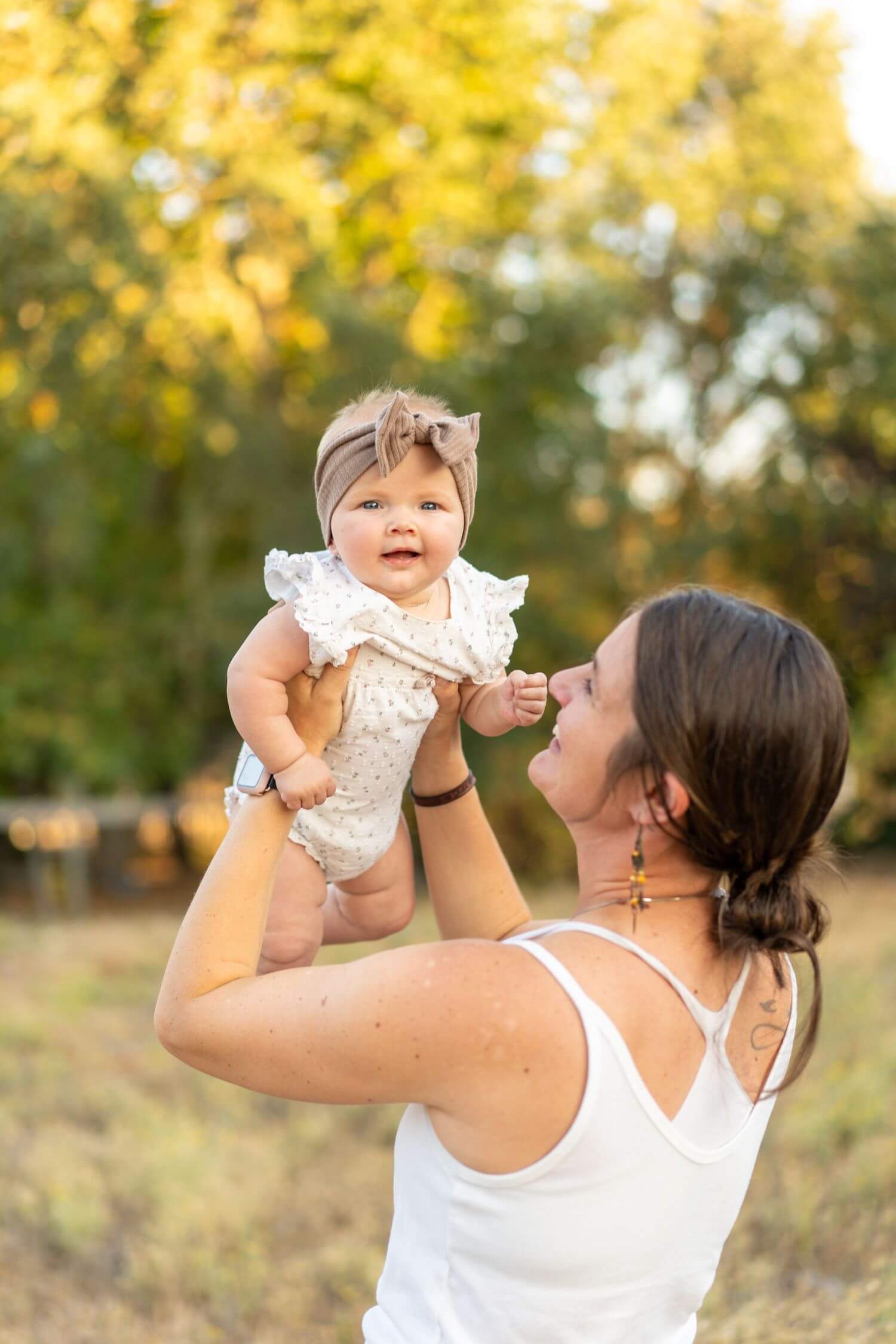 4-smiling-baby-outdoor-mom-holding-sunny.jpg