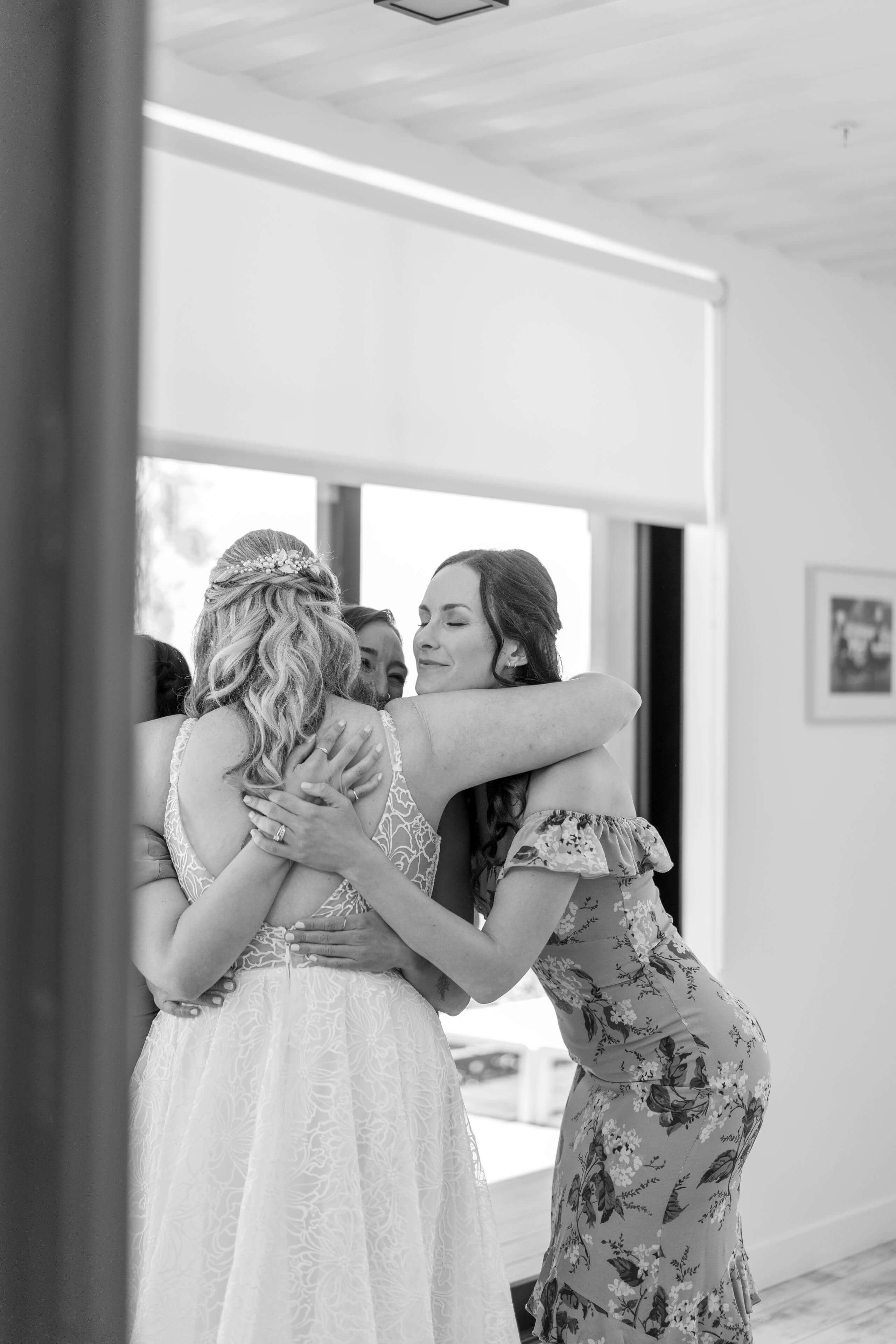 wedding-bride-group-hug-central-coast-timeless-images.jpg