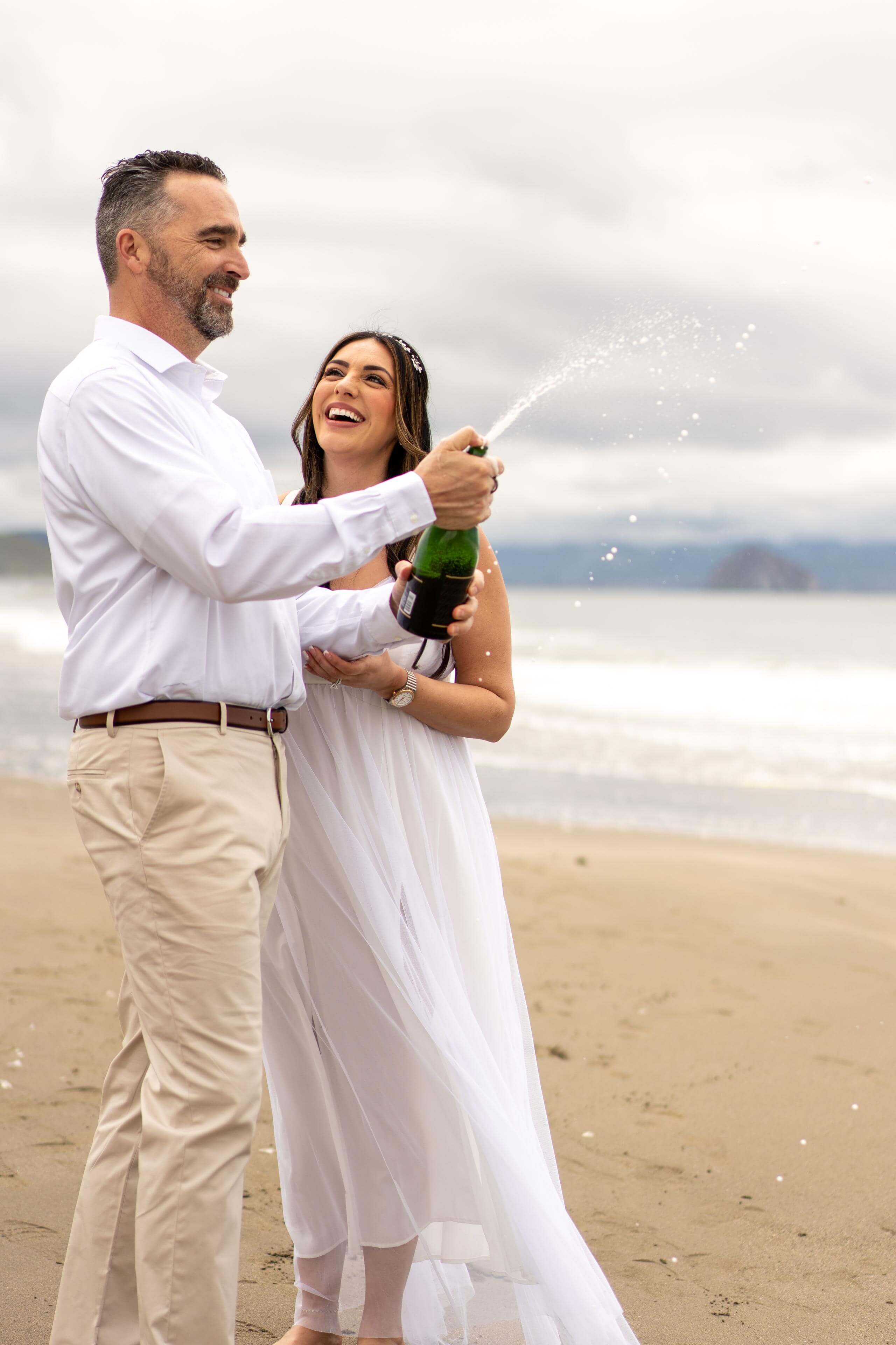 beach-wedding-champagne-celebra...tral-coast-timeless-images.jpg