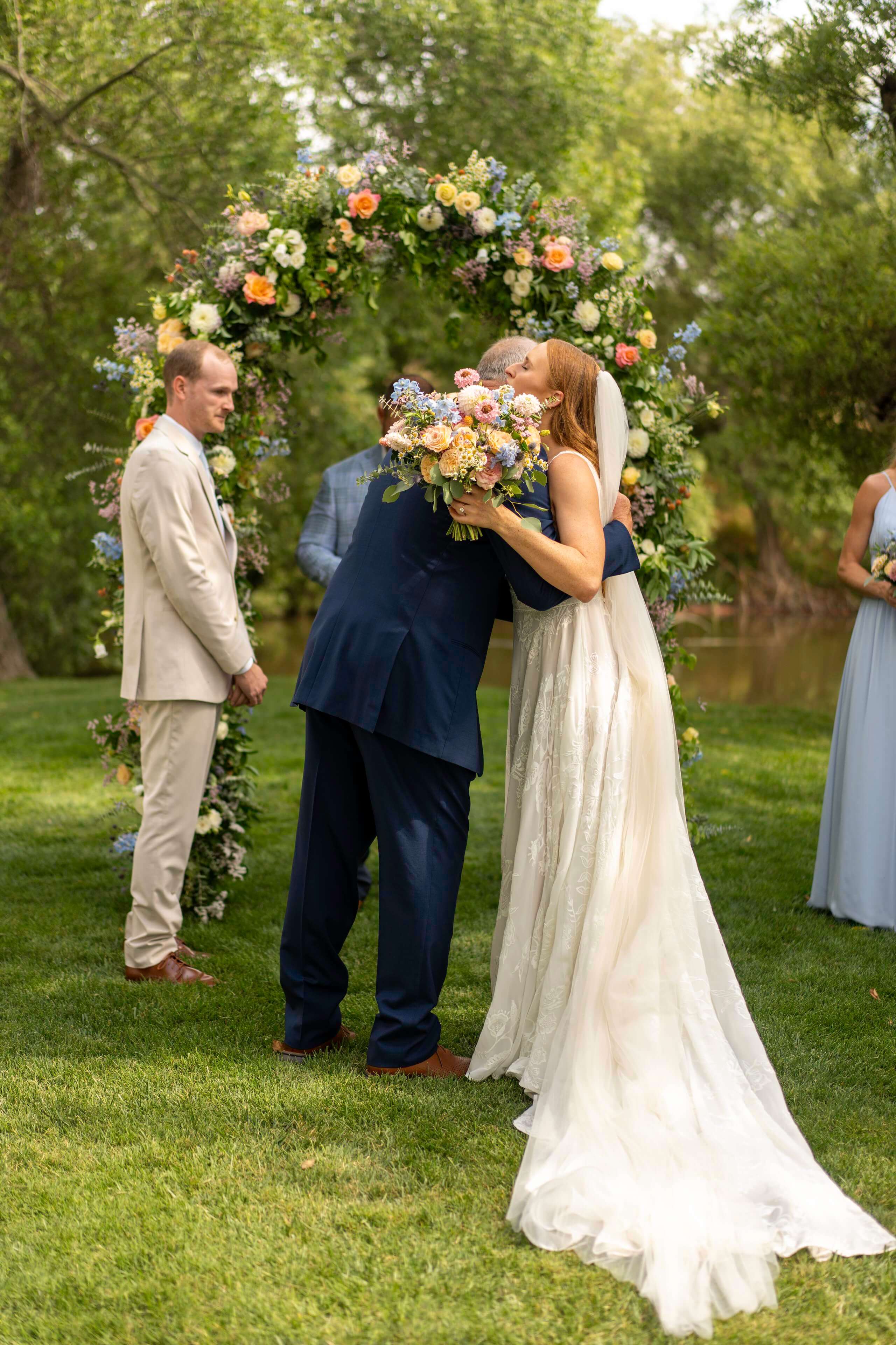 timeless-images-central-coast-ca-wedding-ceremony-hug.jpg