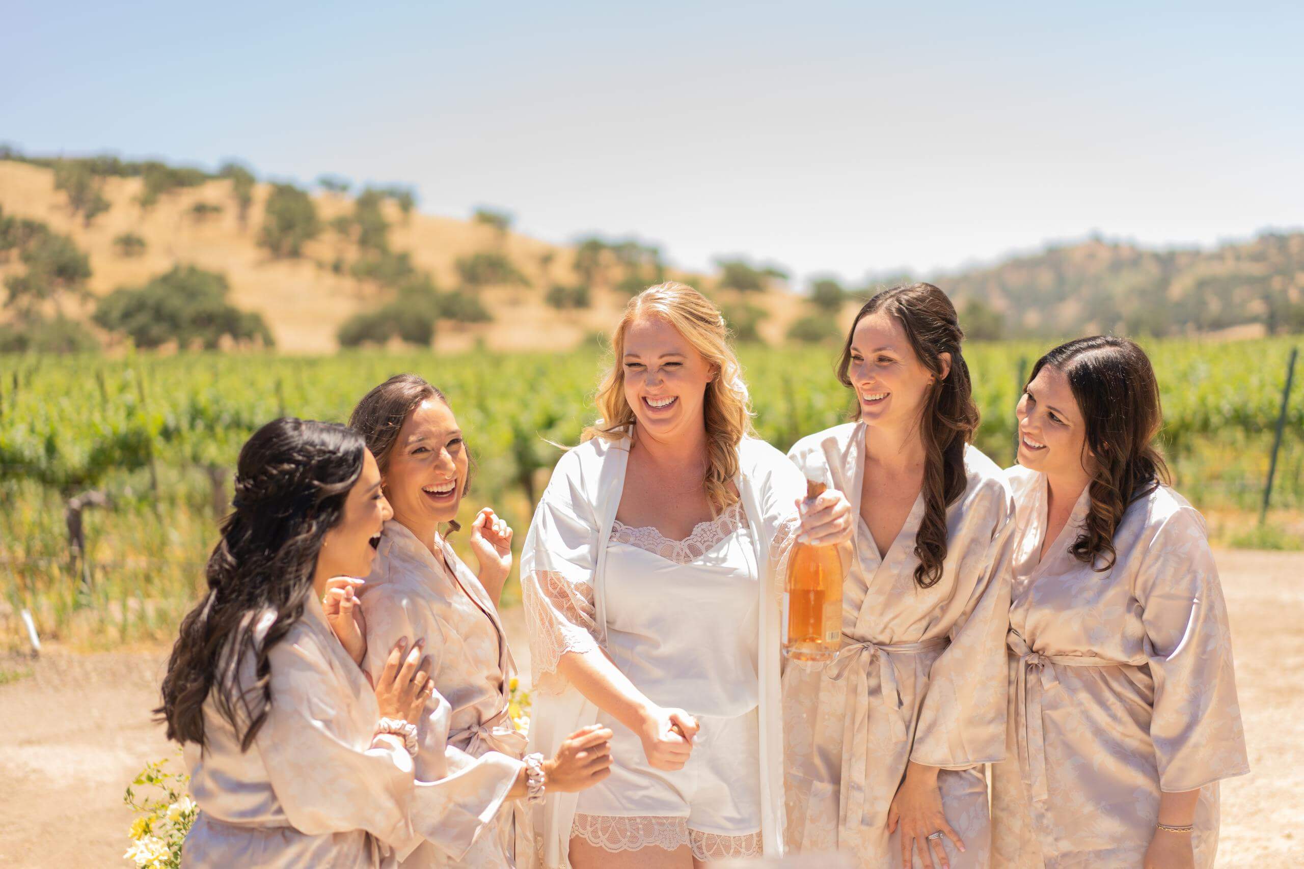 bridesmaids-toasting-vineyard-w...california-timeless-images.jpg